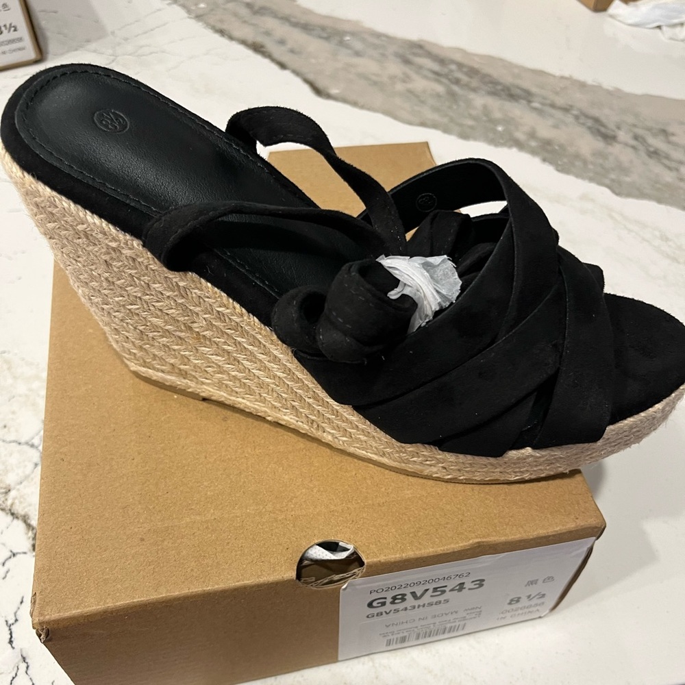 Black Espadrilles available in a size 8 1/2